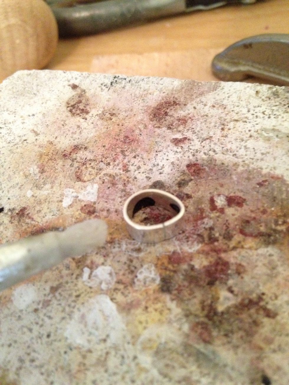 Calculate how much 0.8mm thick metal sheet you need for your stone. We are making a claw setting so you shouldn't be able to see the metal if you look down onto the stone birds-eye.