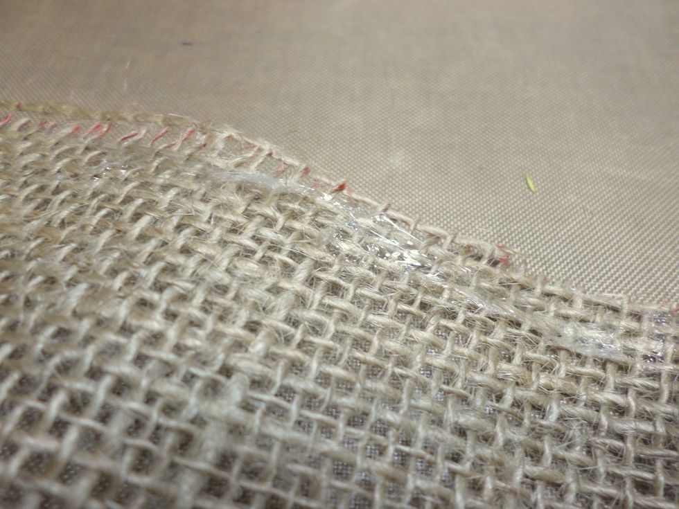 Can you see the line of adhesive? I use burlap a lot in my work and I've never been able to do this! Amazing!