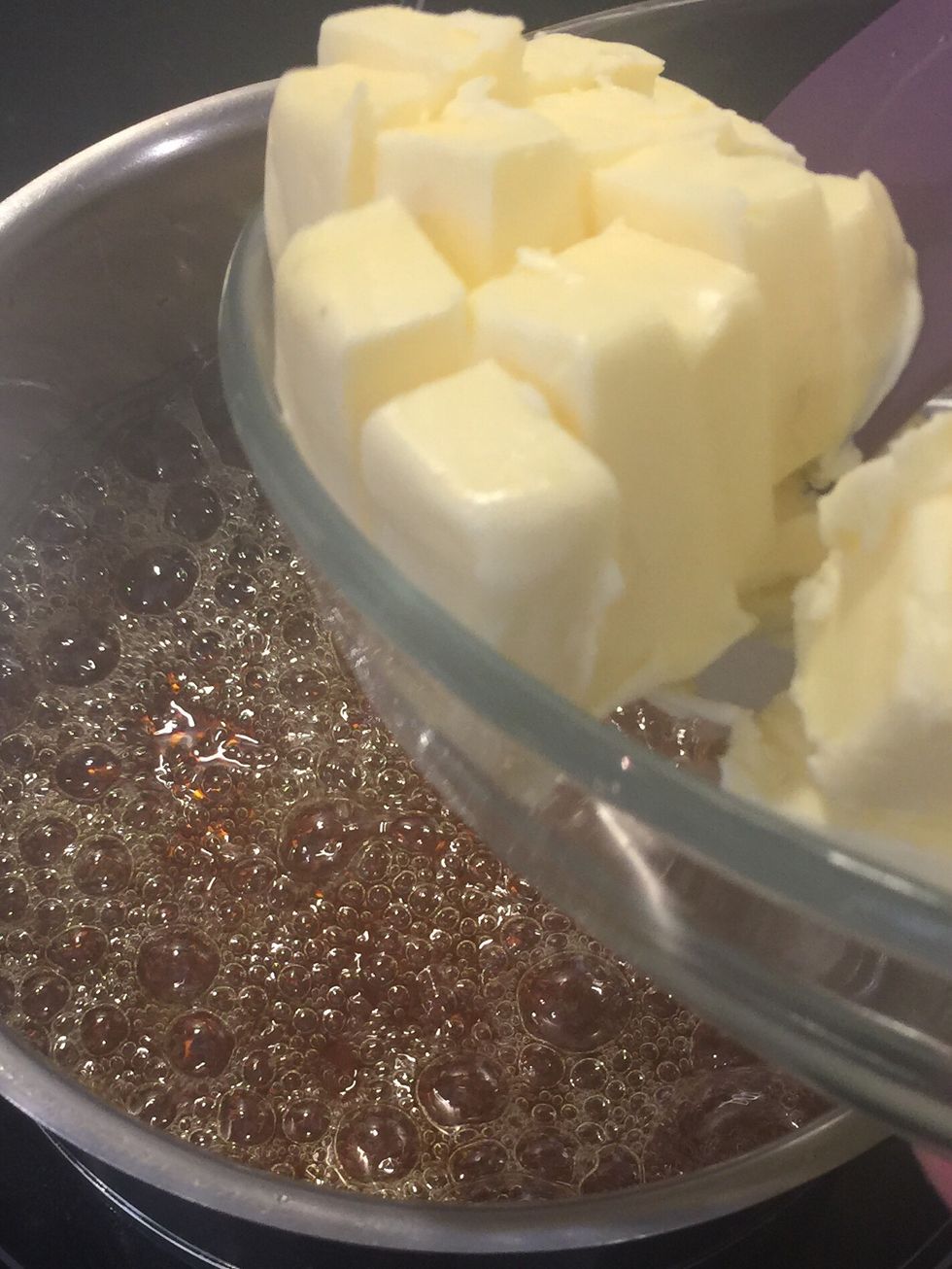 Caramel is done. Add the butter