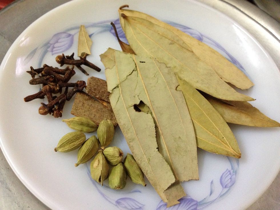 Cardamom, cinnamon, cloves, biryani leaf