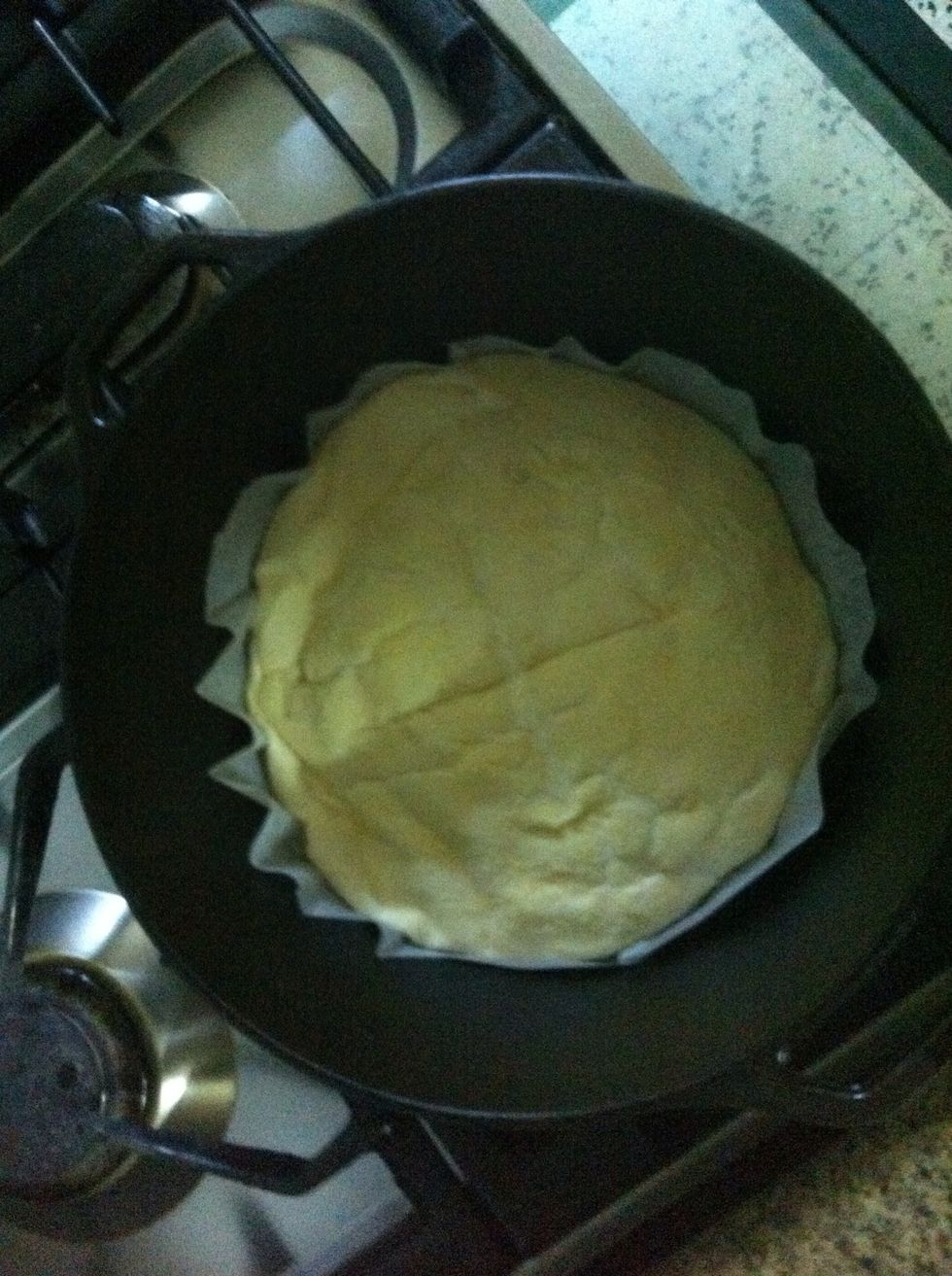 Carefull and slowly place the dough inside