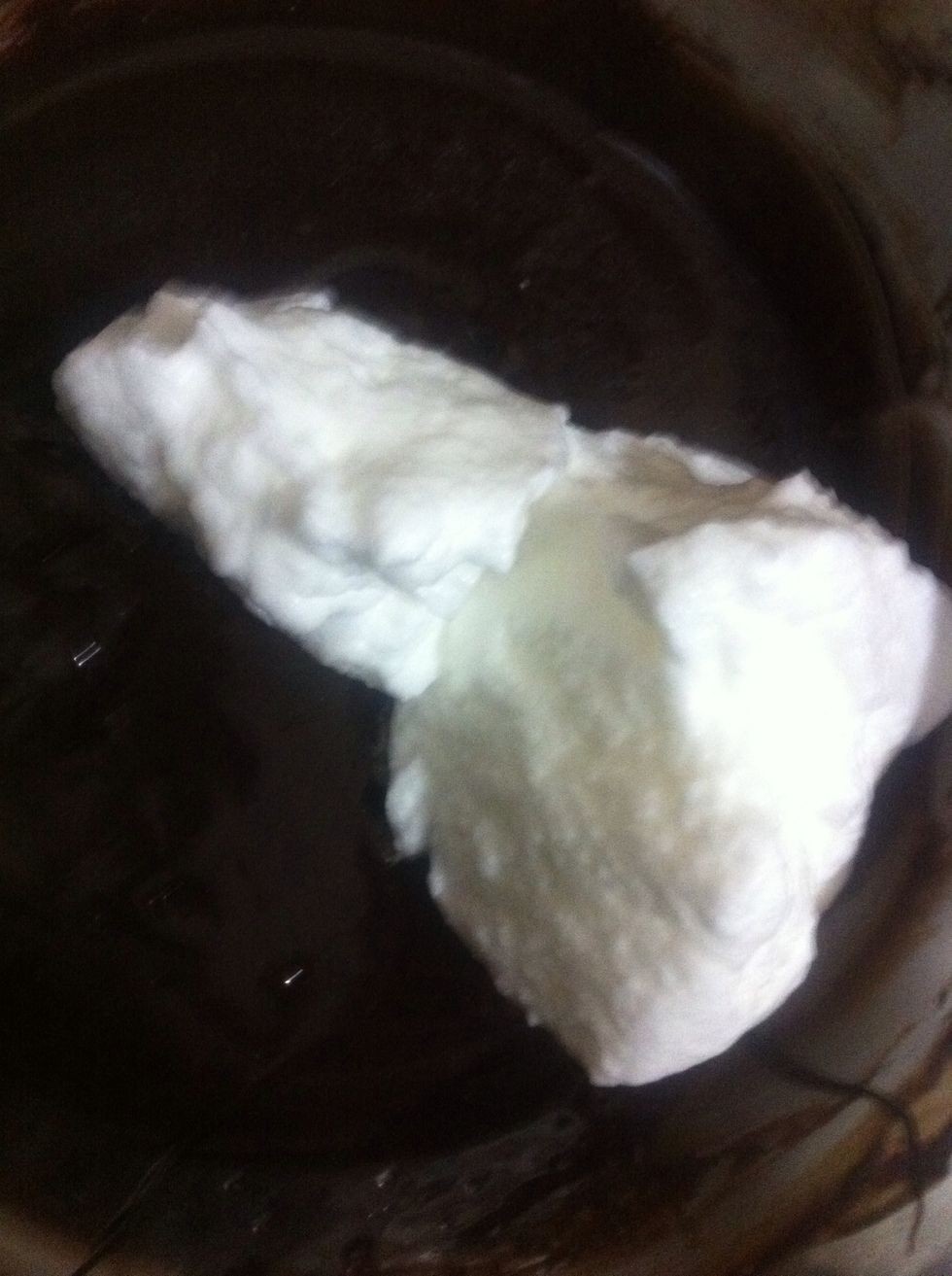 Carefully, add 1 spatula of egg whites to the chocolate melt. Fold in. Gently. Very gently