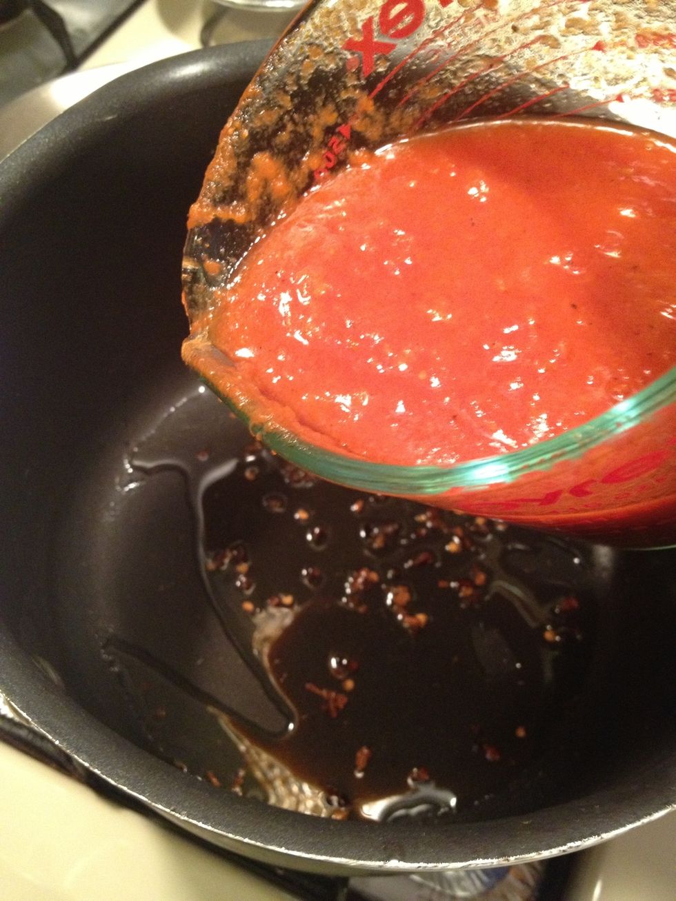 Carefully  add the marinara and vodka to the pot. After you added the marinara and vodka to the pot, it is safe to turn your stove back on.\u263a