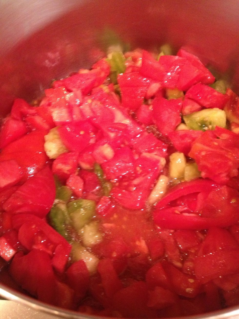 Carefully add the tomatoes without their juices.
