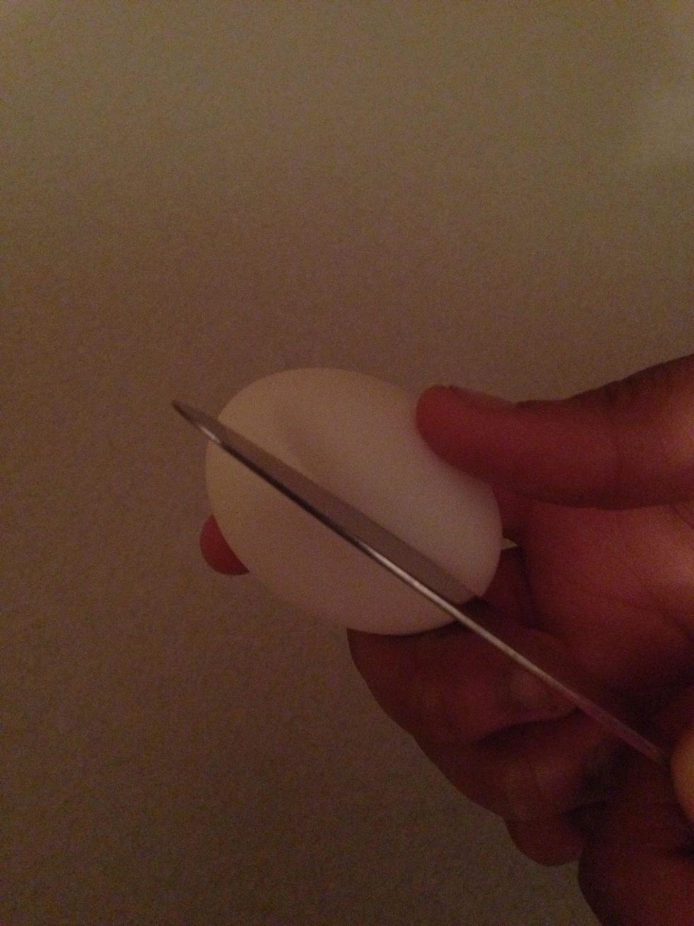 Carefully cut your egg lengthwise.