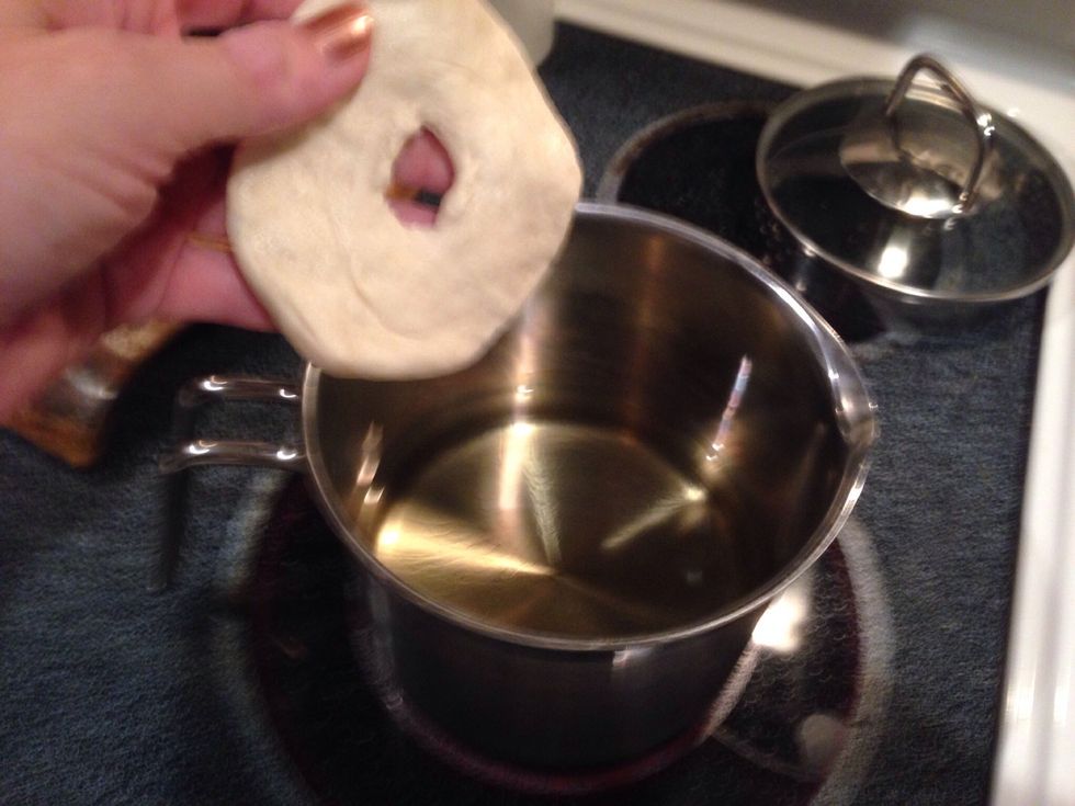 Carefully drop into a pot of hot oil (350 degrees).