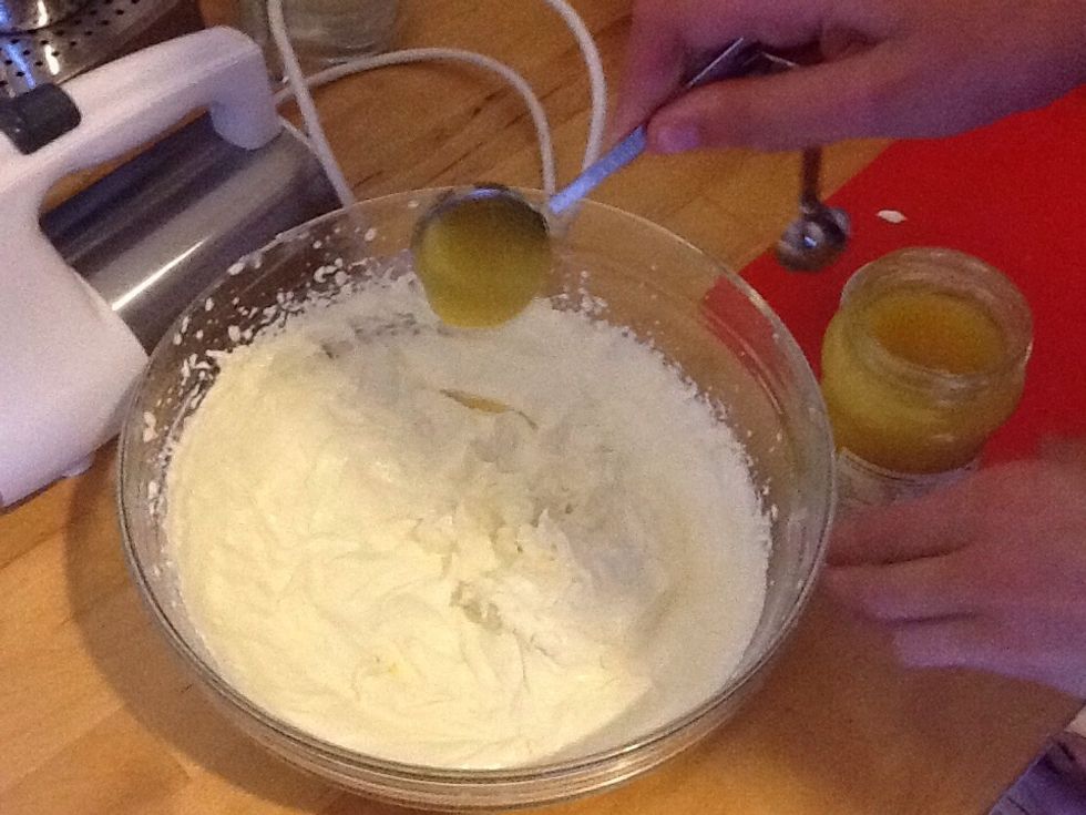 Carefully fold in the lemon curd so the cream is still light and fluffy