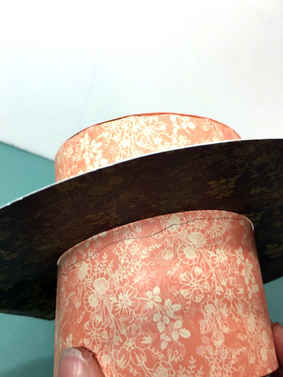 Carefully holding the brim in place, mark underneath the brim where the brim should "sit".