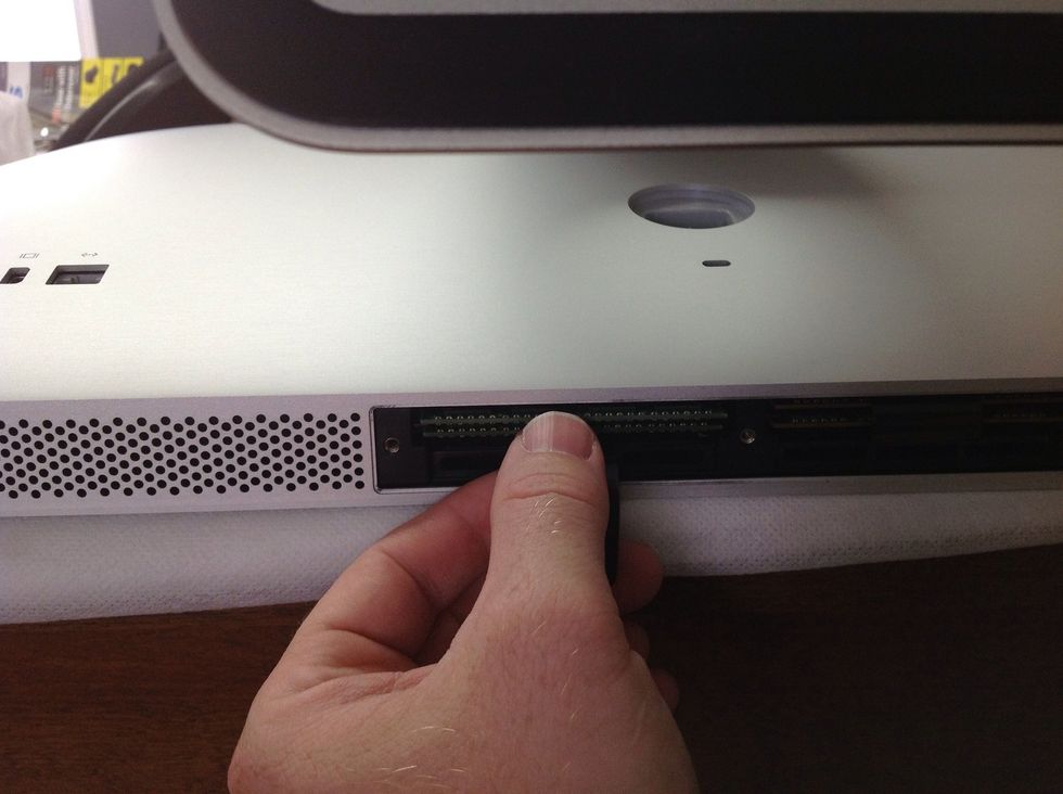 Carefully insert new memory cards in the same orientation the ones you removed were. Push until you feel it pop into place.