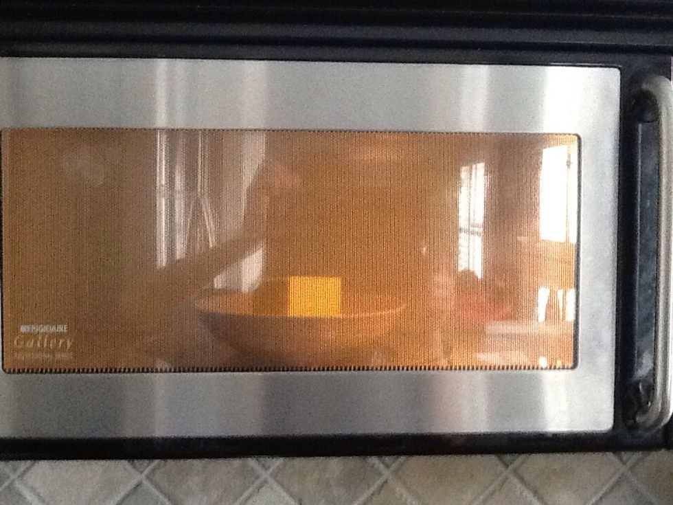 Carefully monitor your butter "defrosting". You don't want it to melt. Your microwave may alert you to turn the food over, do it. Periodically test the butter for softness.
