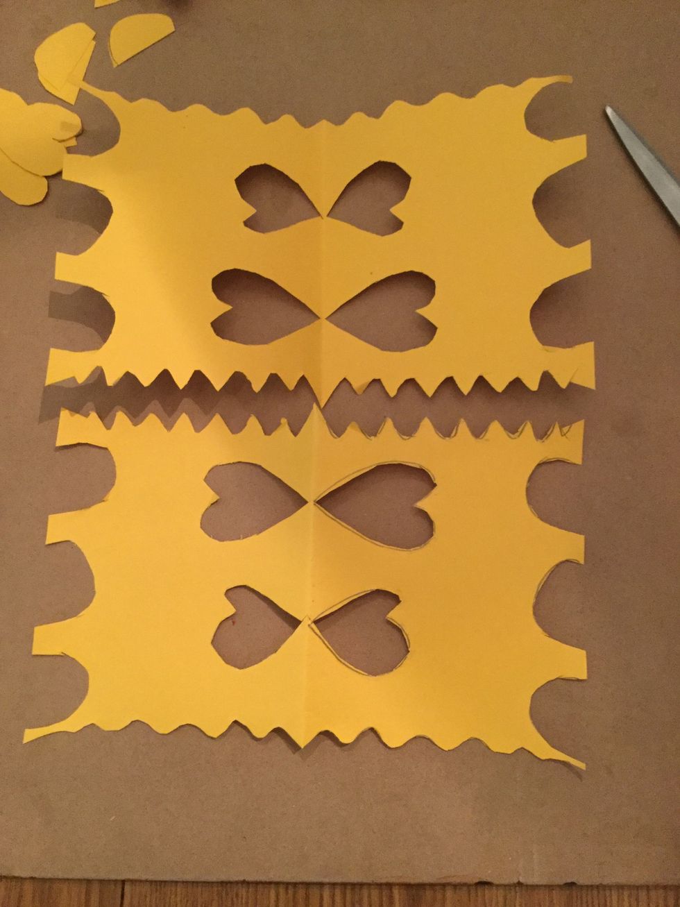 Carefully open up your design. Ta Da! You will notice that your paper is split in half. That is okay.