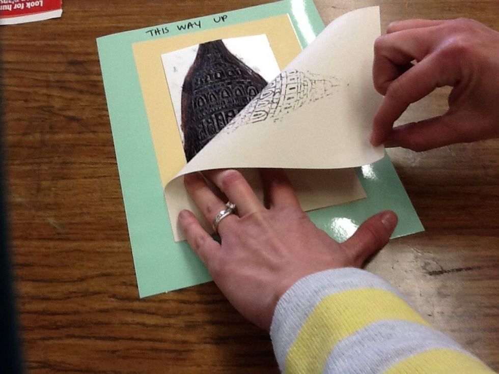 Carefully peel back your paper to reveal your print.