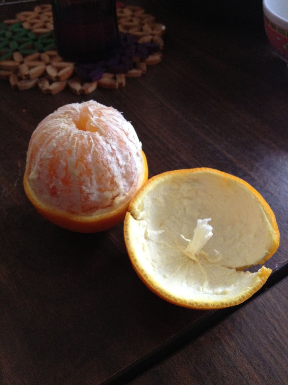 Carefully peel off the top part. You'll know you did it right when you have something sticking out of it.