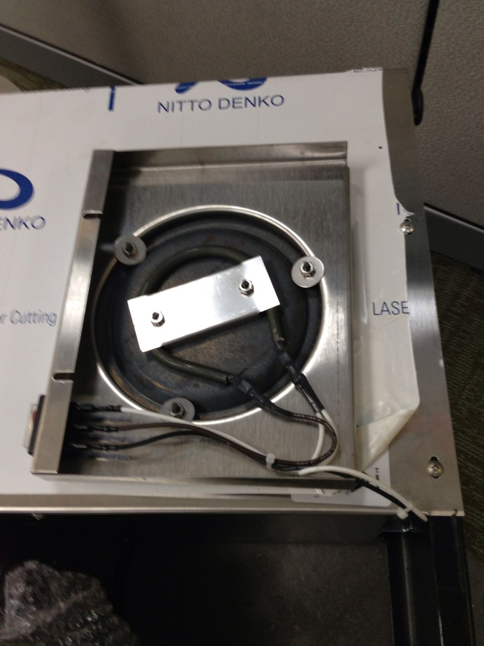 Carefully place element tray on the side of the unit