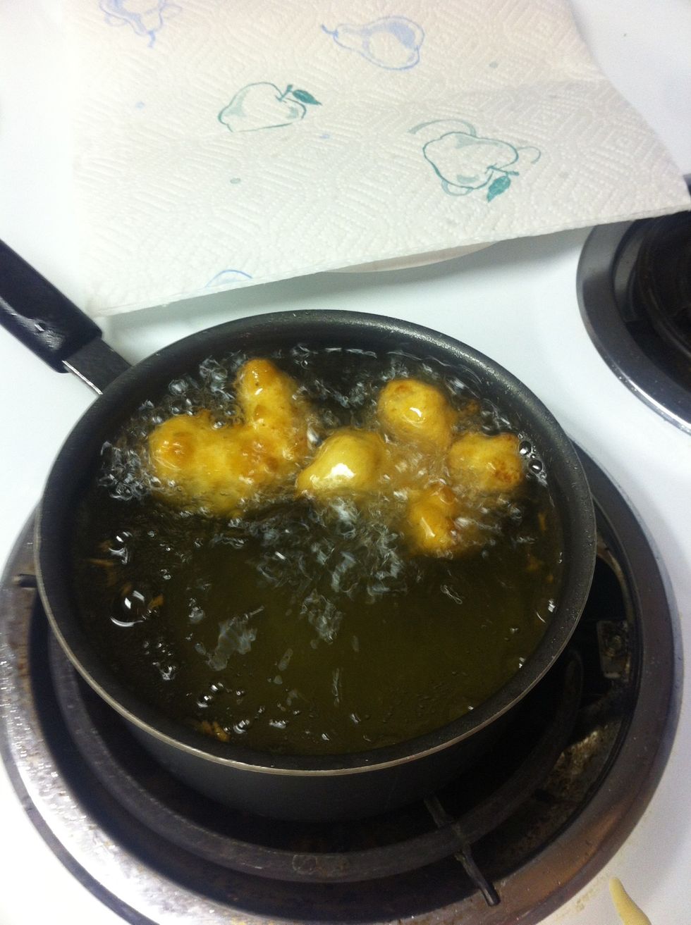 Carefully place shrimp in oil. Cook for approx 5-6 minutes or until shrimp is floating and golden brown.