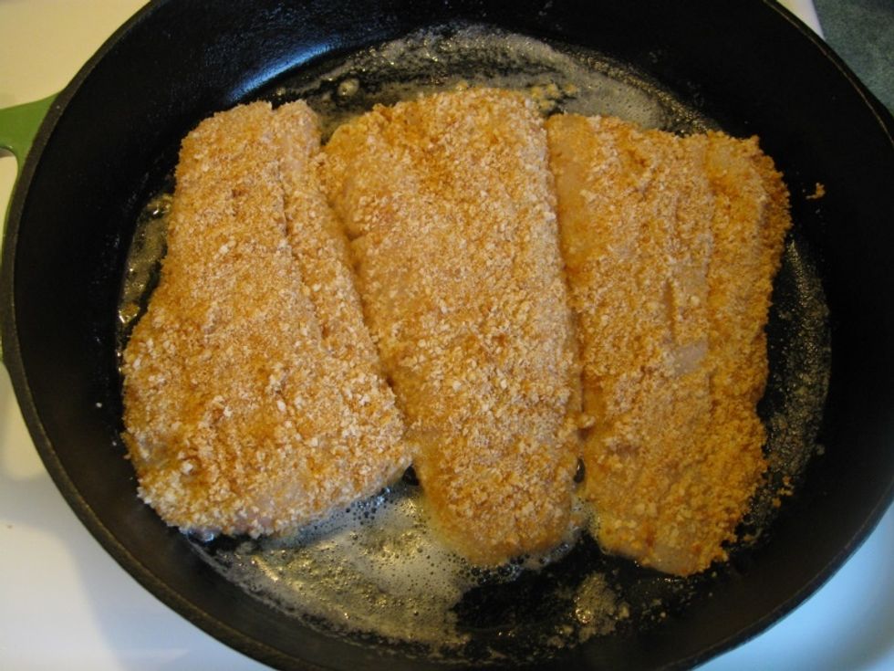 Carefully place the fish into the hot oil. Let it sit for about 2 1/2 minutes and then flip to the other side and let sit for another 2 1/2 minutes. Remove from hot pan and let cool.