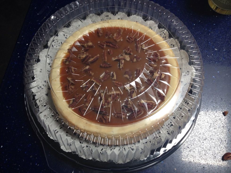 Carefully place the lid over your container and place your cheesecake in the fridge.