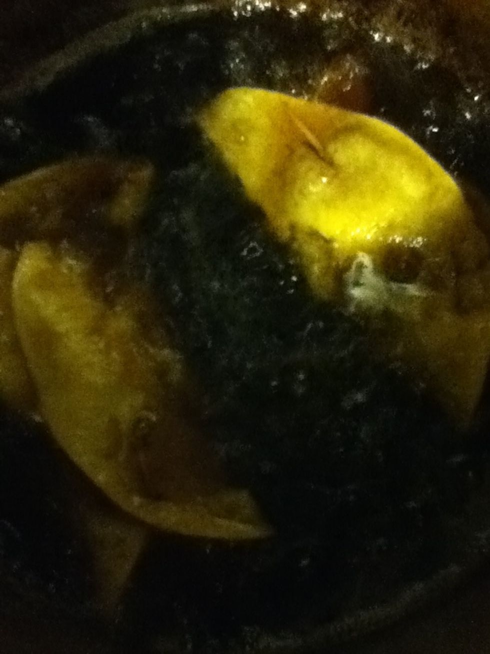 Carefully place the tinga into the deep fryer and fry to a crisp
