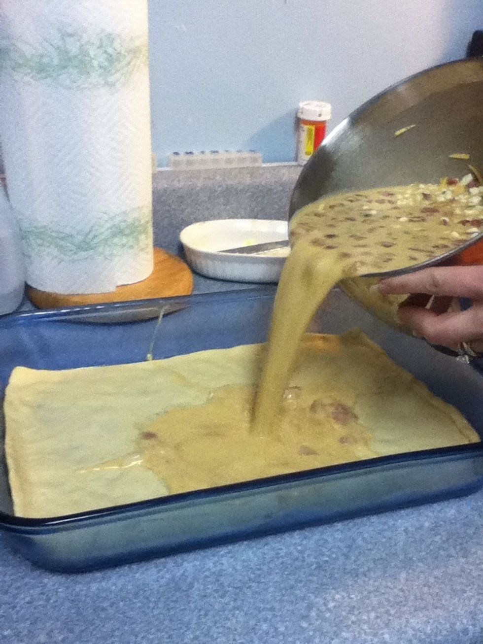 Carefully pour egg mixture over crescent dough.