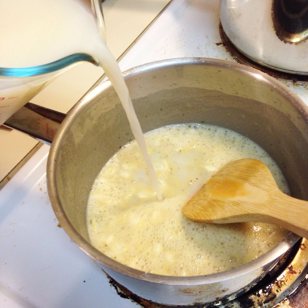 Carefully pour in your chicken broth and milk.
