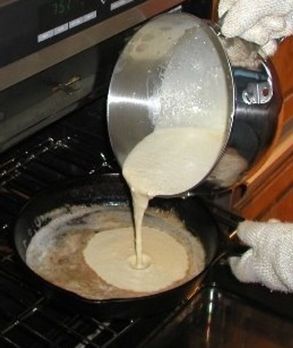 Carefully pour the batter into the heated skillet.