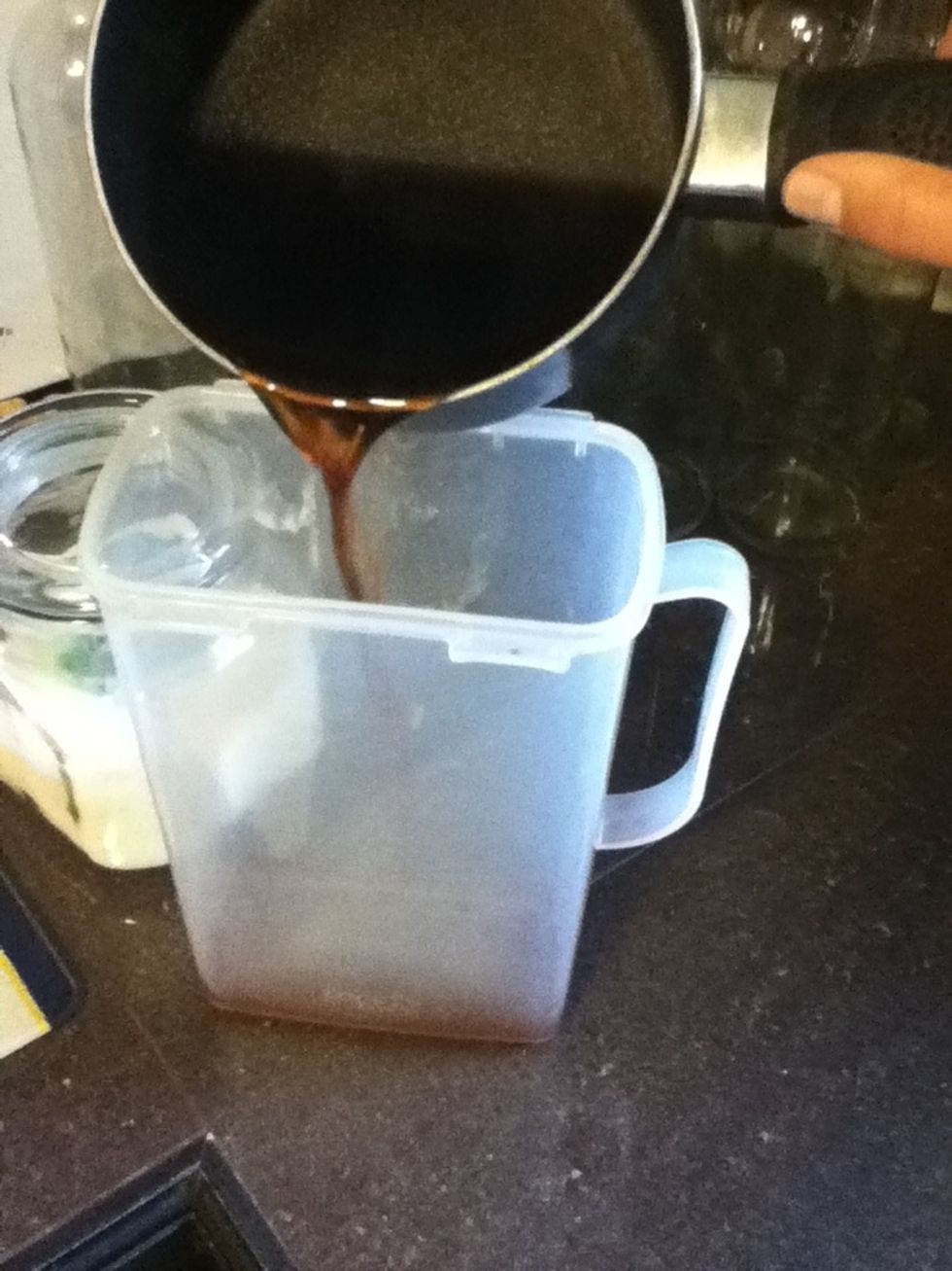 Carefully pour the tea into your pitcher then fill the remaining pitcher with cold water. Leave room for the sugar to go in...