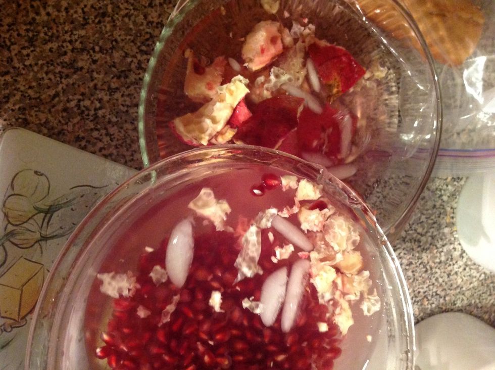 Carefully pour the water, ice cubes, and membrane pieces into a separate bowl and discard