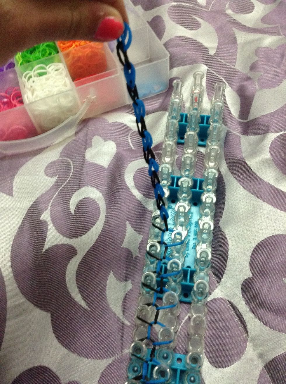 Carefully pull the bracelet off the loom