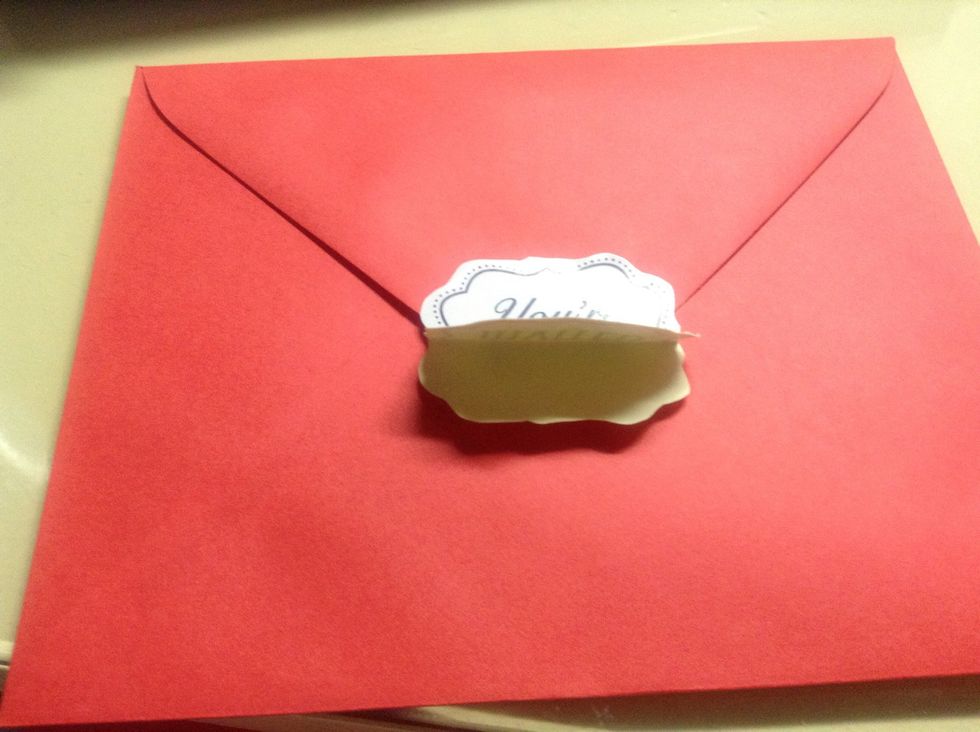 Carefully pull the yellow part of the double sided. Be sure that you have already put all the necessary print outs inside the envelope before you lock it! :)