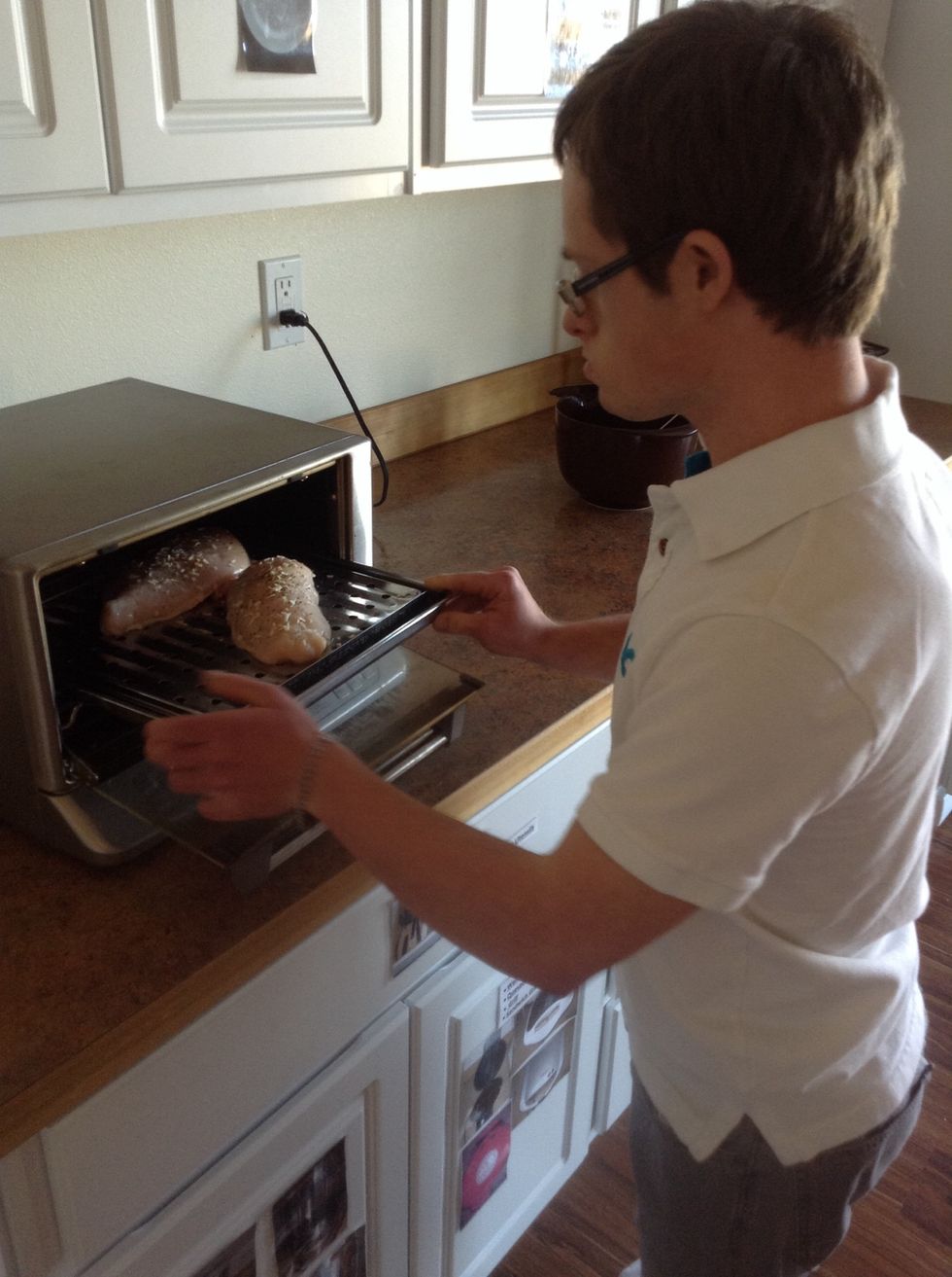 Carefully put baking sheet in oven