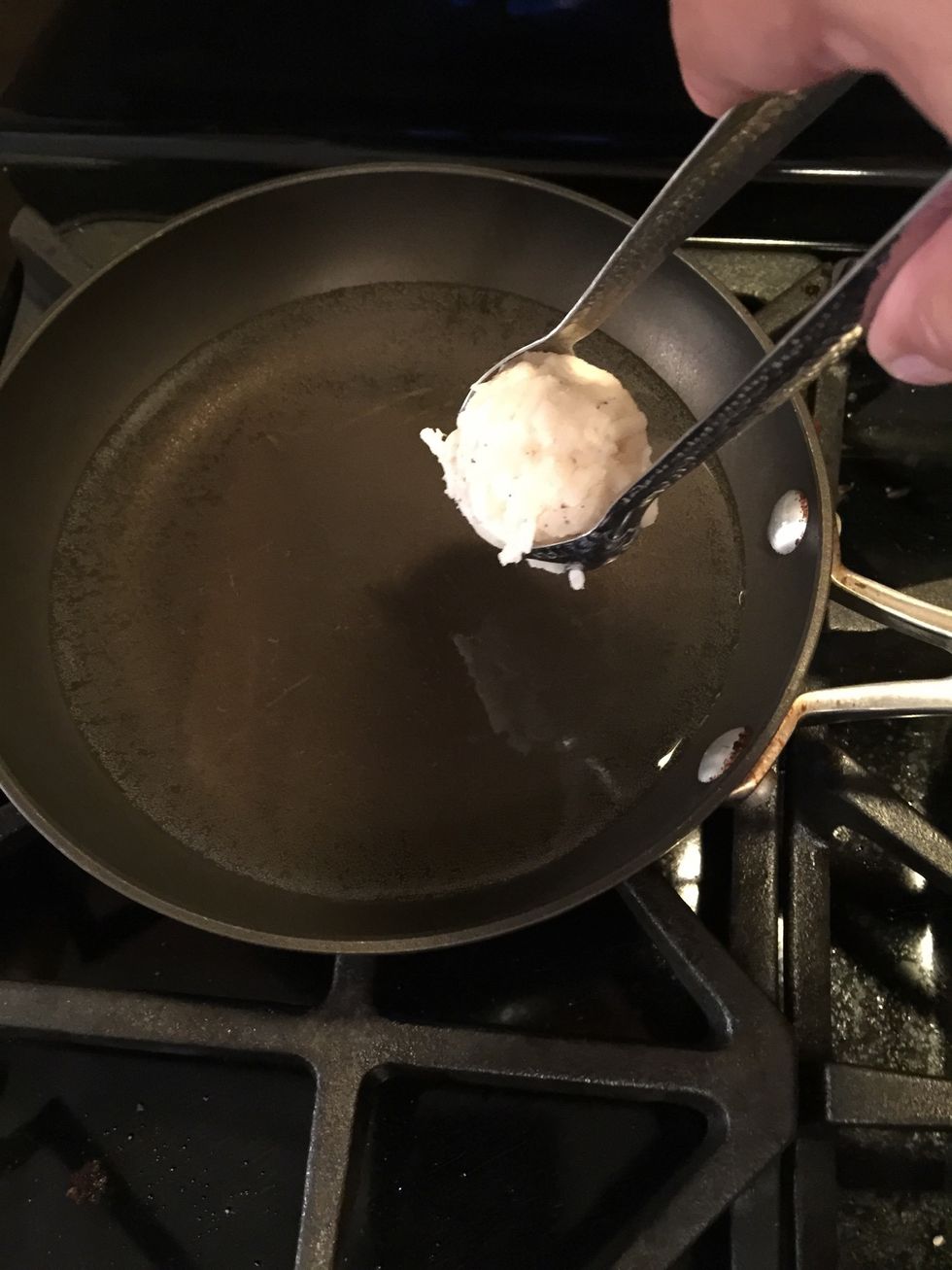 Carefully put tater tot in hot oil