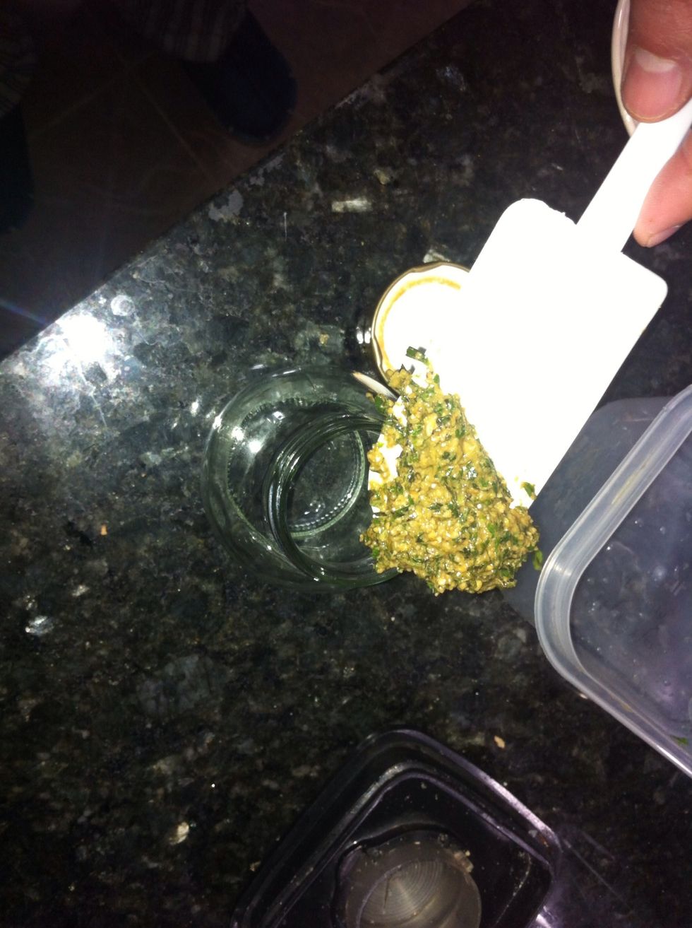 Carefully remove all the pesto from the food processor using a spatula. Pour it into a nice glass container.