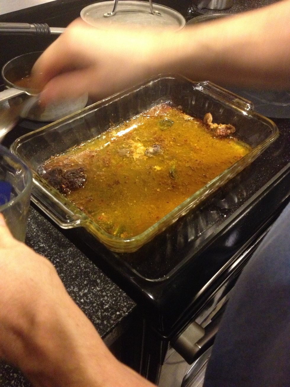 Carefully remove chicken and beer you will need someone to help hold the base. Put chicken to rest aside. Remove neck and liver and discard (unless you want it) We just used it for the flavor