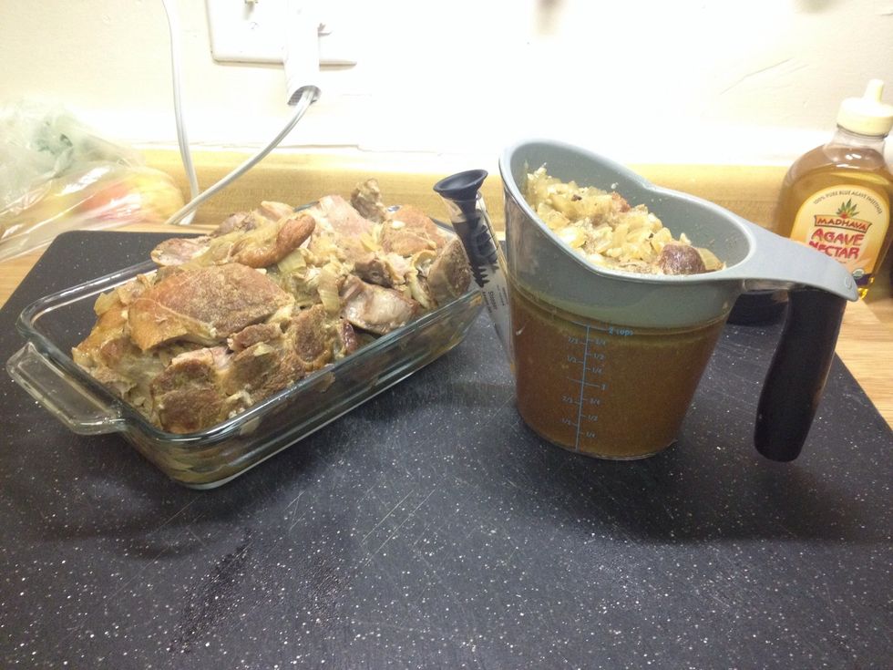 Carefully remove meat from cooking  liquid and place in a dish. Try not to break the meat up. Pour cooking liquid into a fat separator with strainer to catch onion, garlic and any loose pieces of meat