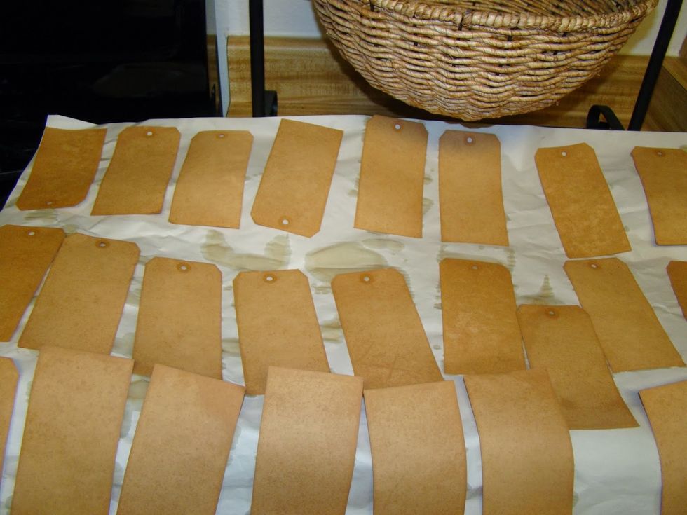 Carefully remove tags from pan and lay out to dry. At this point you have your tea stained tags, but keep on going for the grunge and the vintage look.