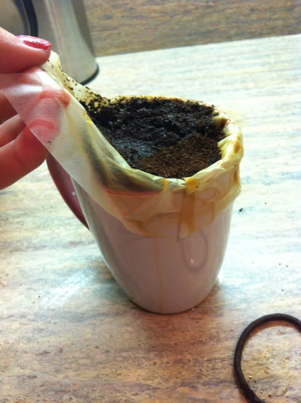 CAREFULLY remove the coffee filter