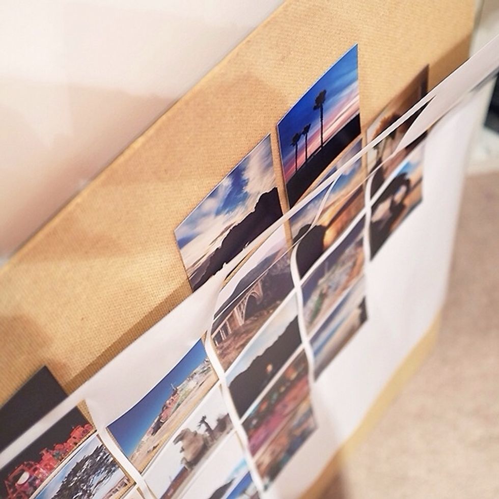 Carefully remove the heart collage to reveal the photo prints in a heart shape.