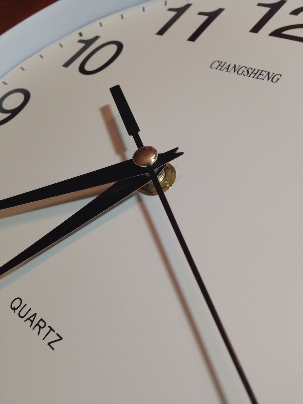 Carefully remove the hour, minute and second hand. They normally pop off by just pulling them out straight from the clock mechanism.