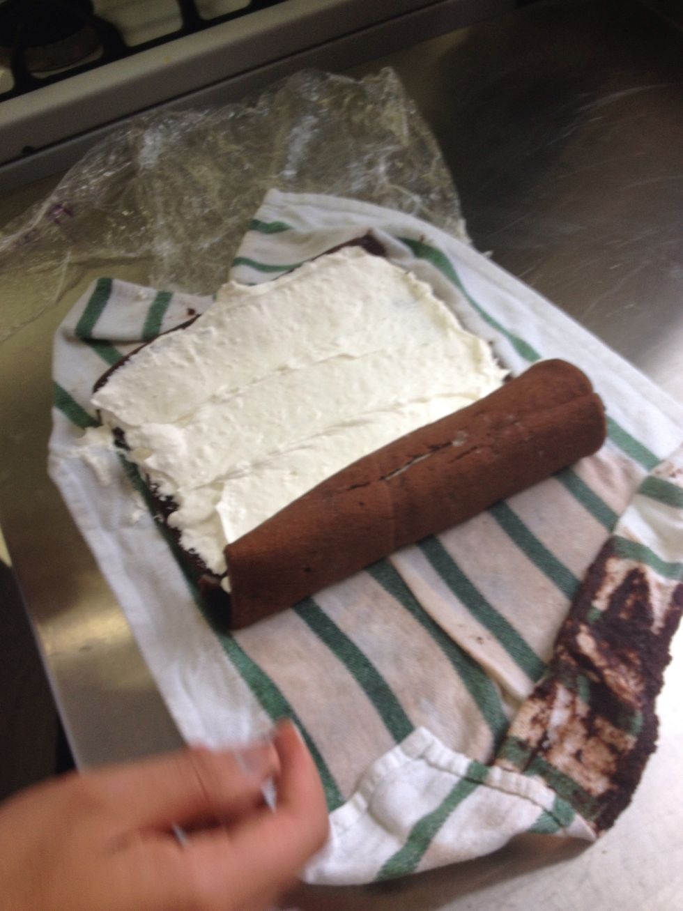 Carefully roll the cake up so that is has its spiraled center