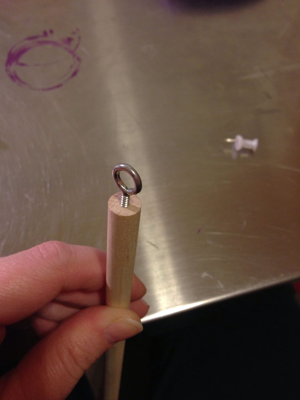 Carefully screw in the eye screw.