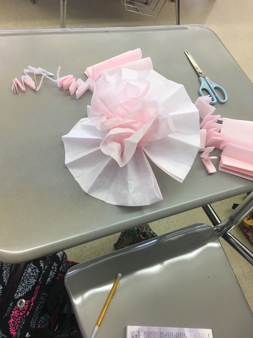 Carefully separate and fluff each piece of paper