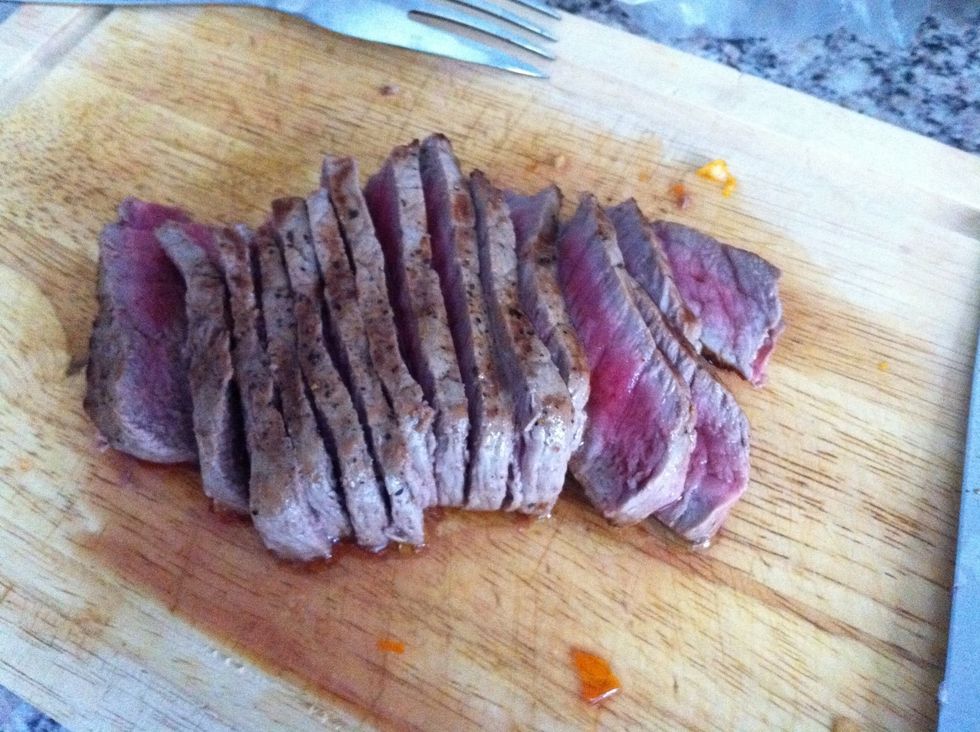 Carefully slice steak.
