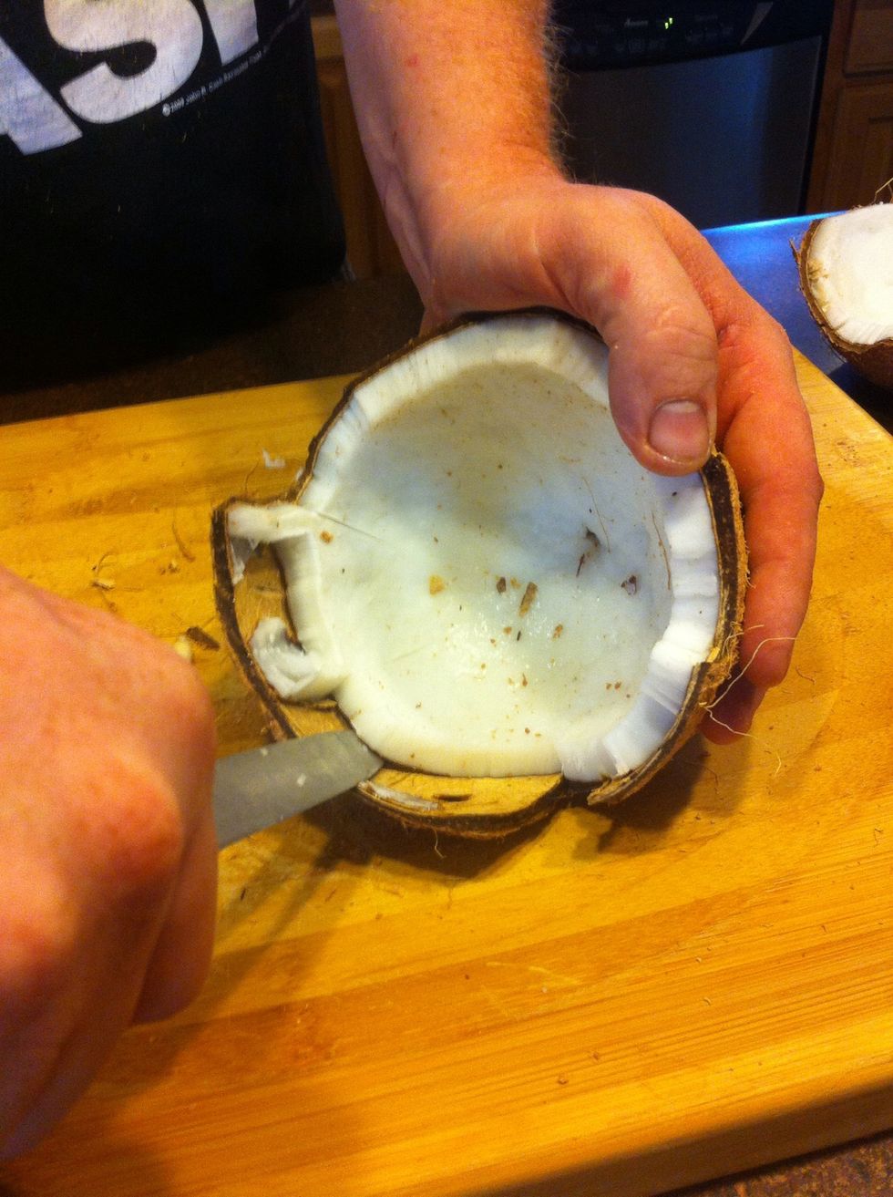 Carefully slip the knife in between the shell and the flesh. The flesh should pop right out, although you may have to use a little force, working the knife back and forth for leverage.