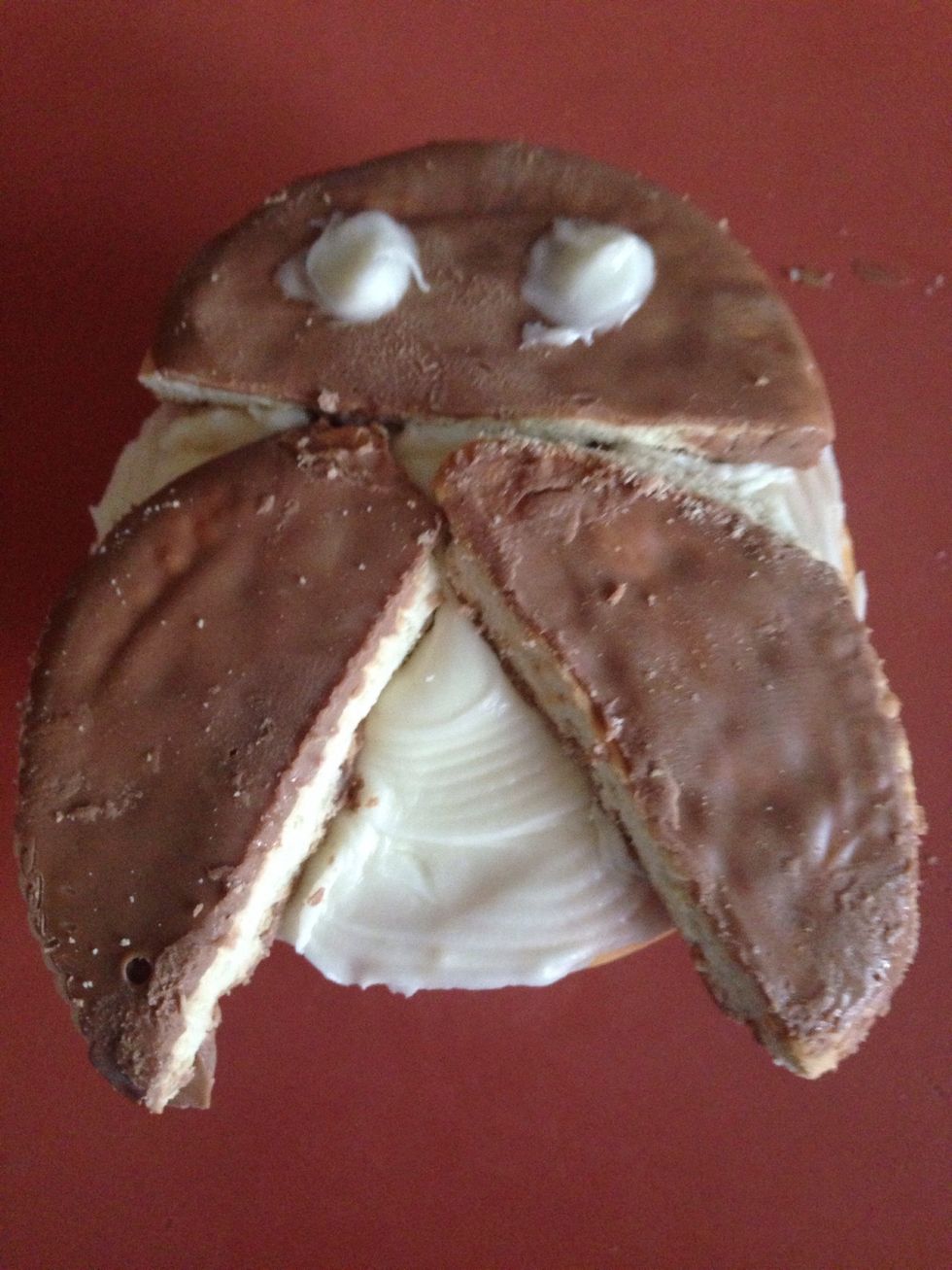 Carefully swirl 2 circles of better Crocker icing where the eyes will go on the head of the owl.