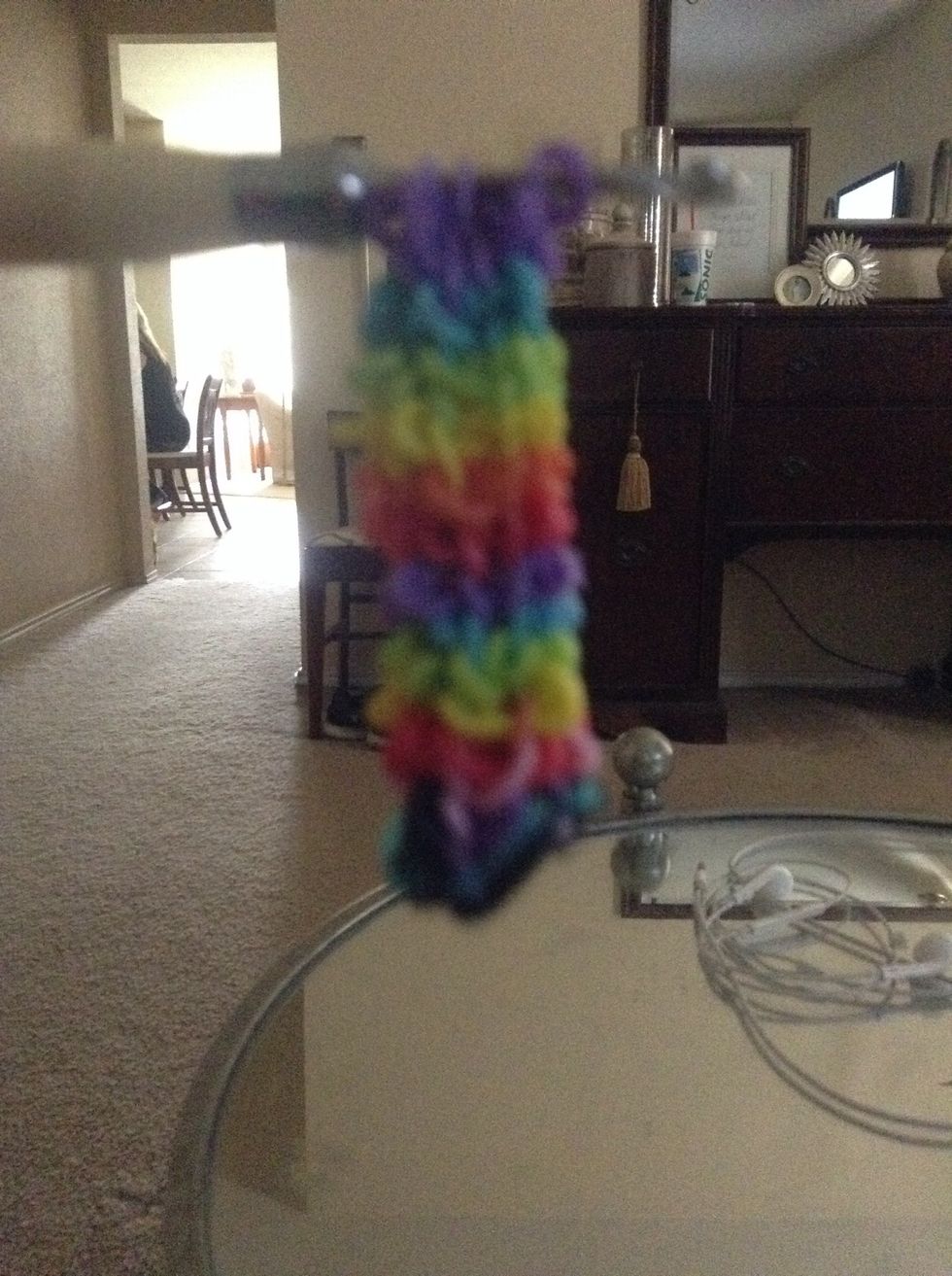 Carefully take it off the loom and secure the remaining band. Then clasp it together and your done!
