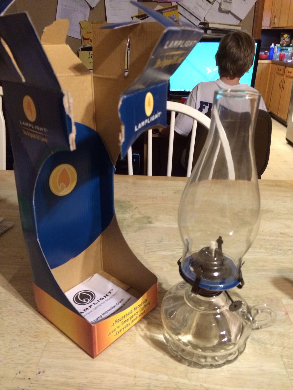 Carefully take lamp out of container. The chimney especially is quite thin and very breakable. I know I have broke a few of my mother's on accident. \ud83d\ude33