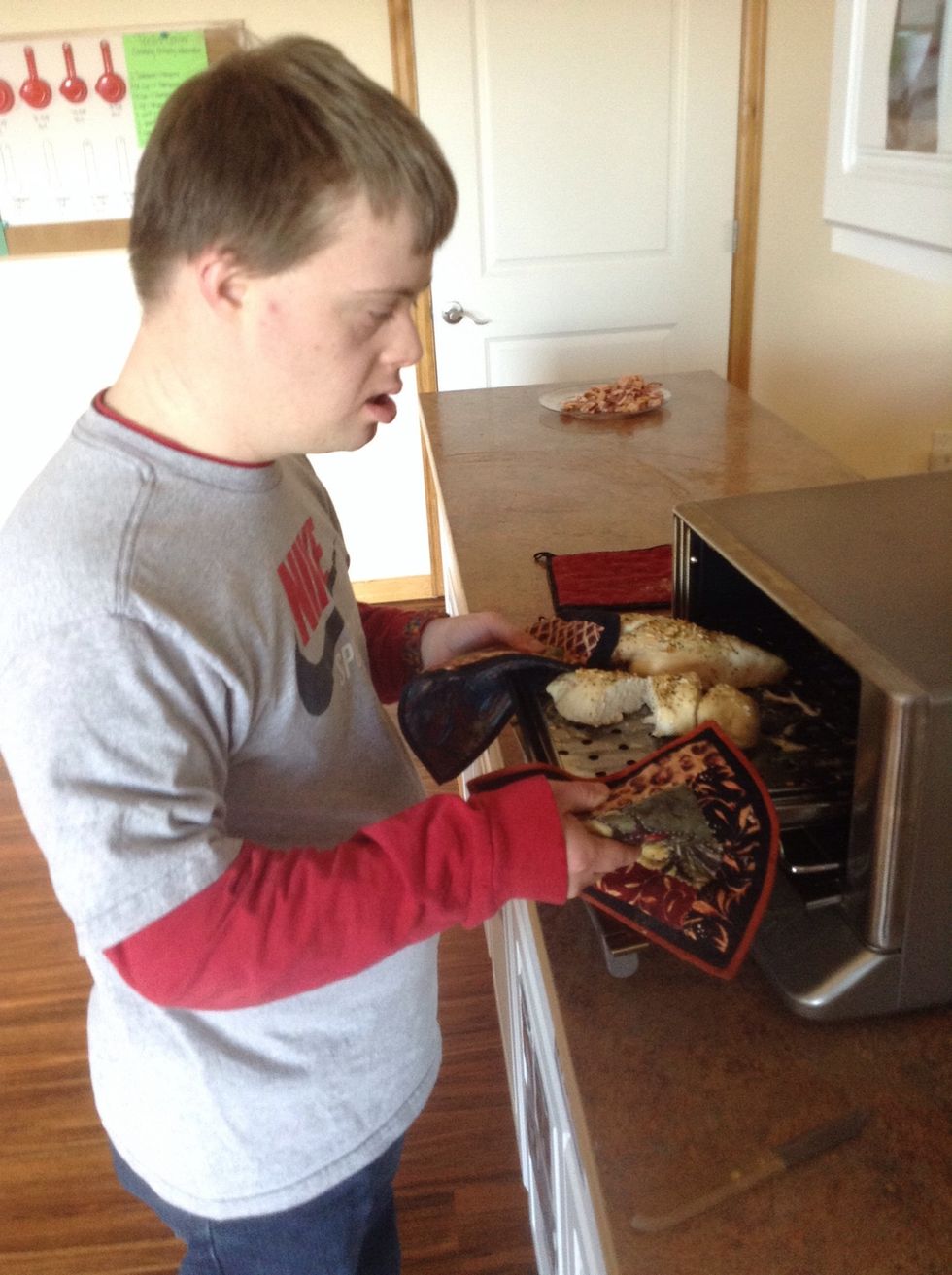 Carefully take out baking sheet using pot holders