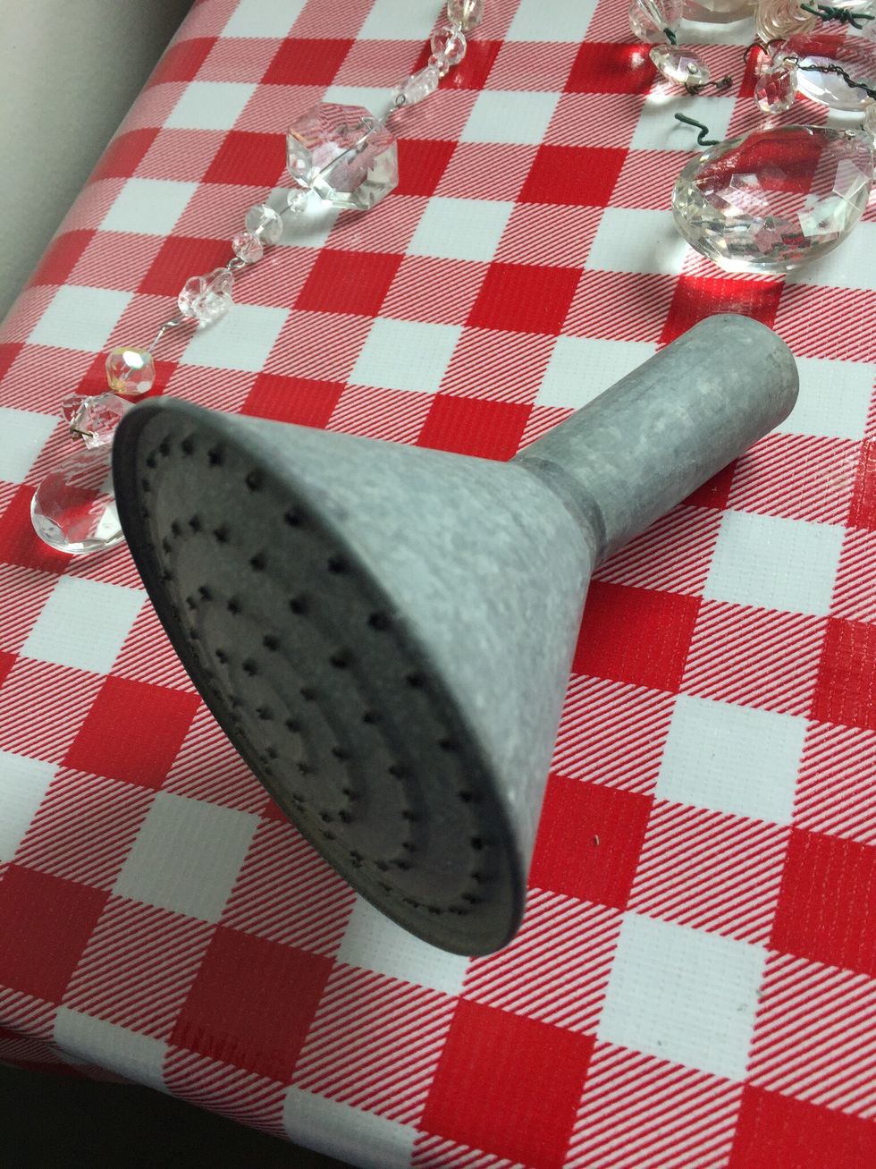 Carefully take spout off can