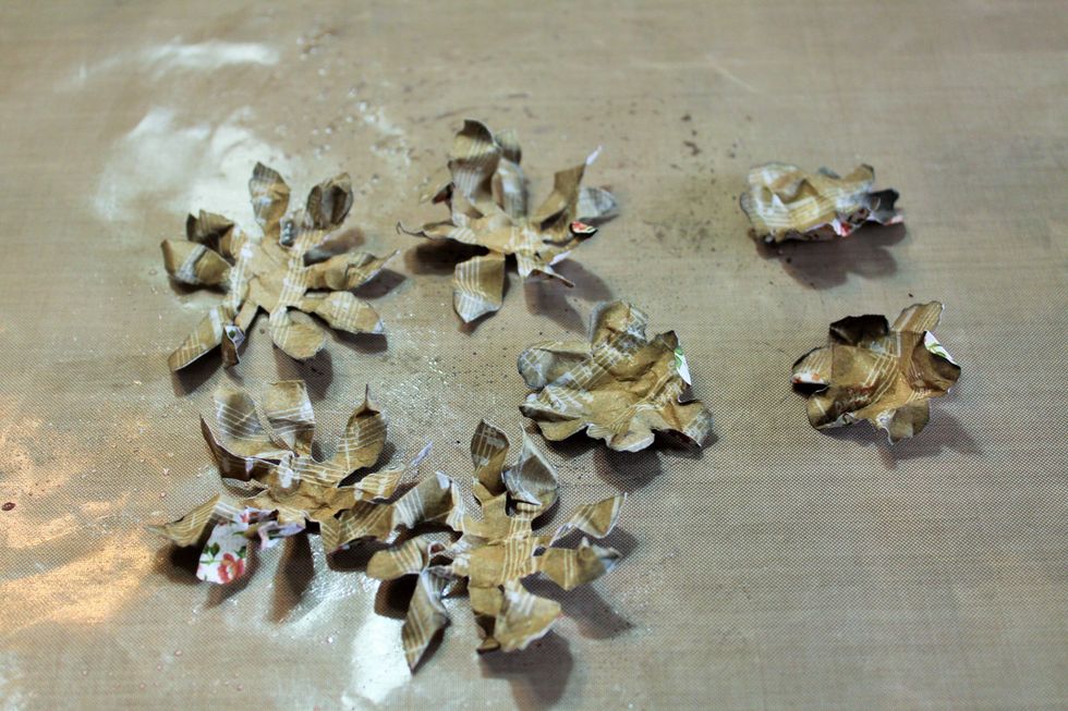 Carefully unfold the flowers.