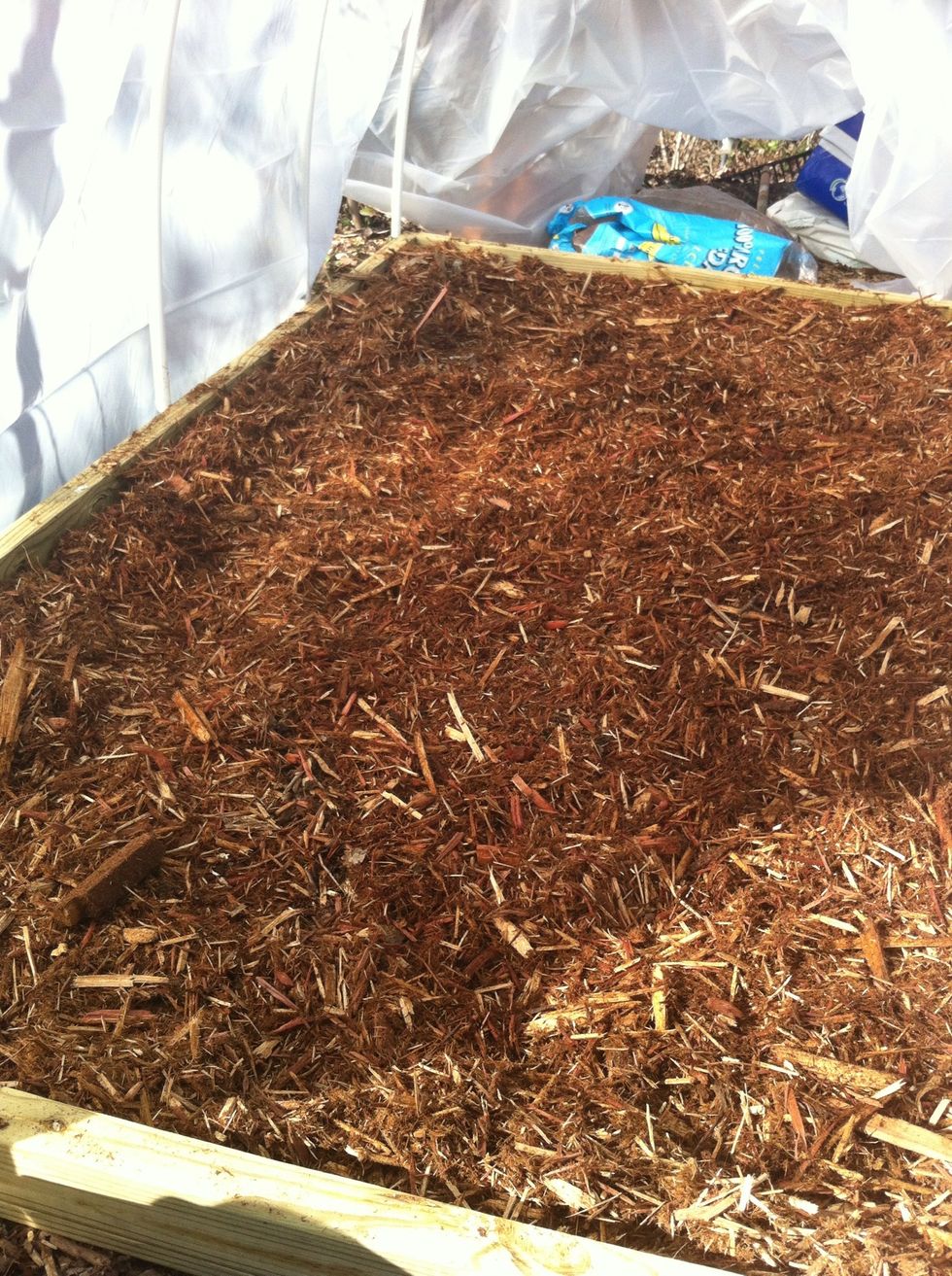 Carry hoop house structure to desired position in yard. If using for seedlings, we recommend putting down a bag of cedar mulch to help maintain steady temps, moisture + control unwanted bugs & slugs.